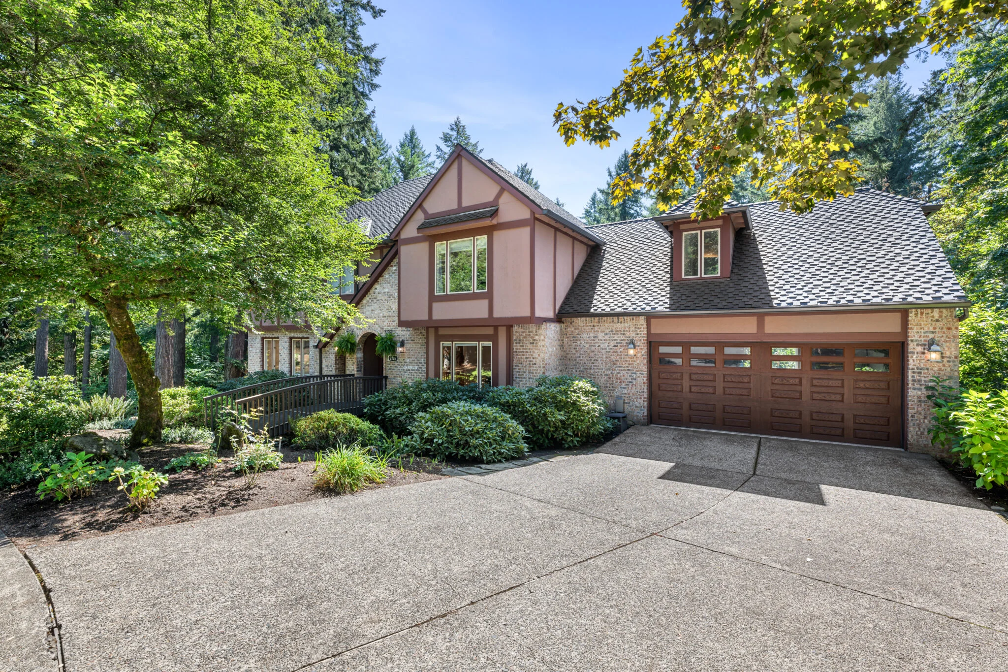 Front exterior of 2726 SW 28th Drive, Portland, with footbridge entry
